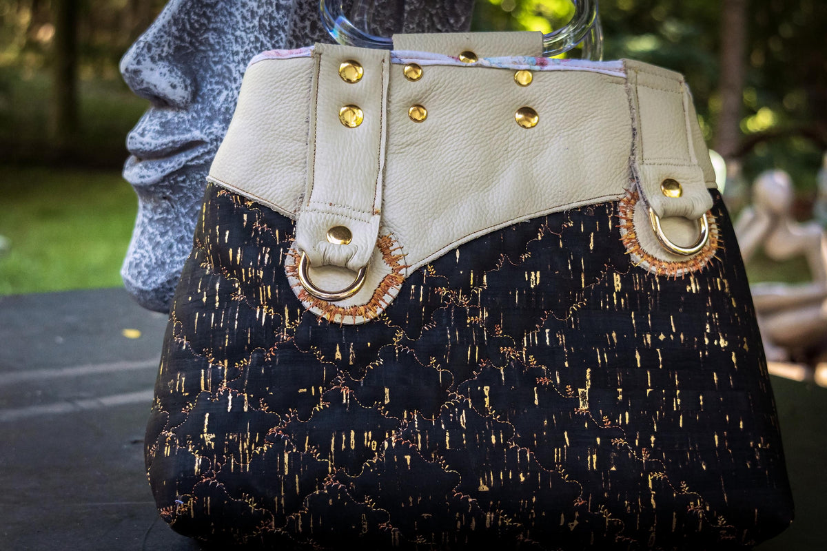 The Gilded Eclipse-Handmade cork and natural leather, and top handle bag with gold chain.