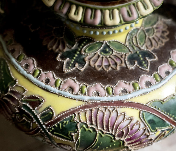 Hand-painted floral motif on the Meiji era porcelain vase